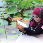 Muslim girl reading